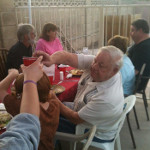 Desiree's extended family having a backyard dinner